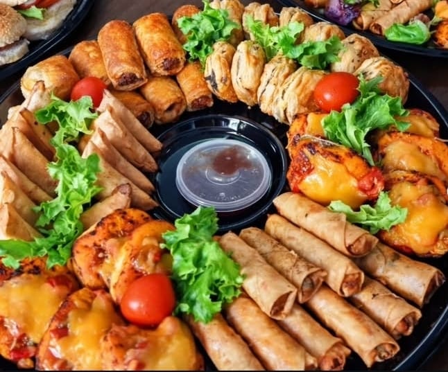 Savoury platter with spring rolls and mini pizzas